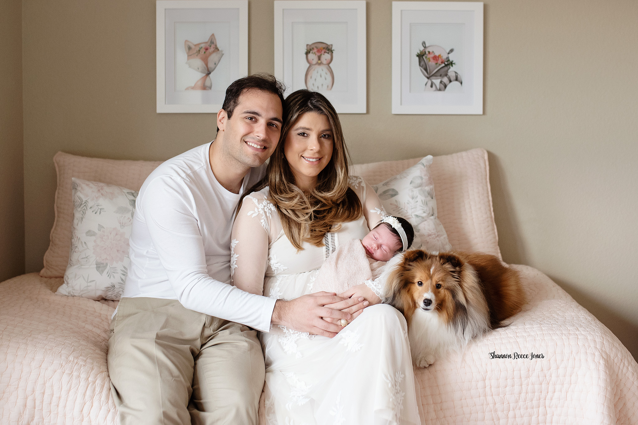 at home newborn photos of parents with baby in nursery
