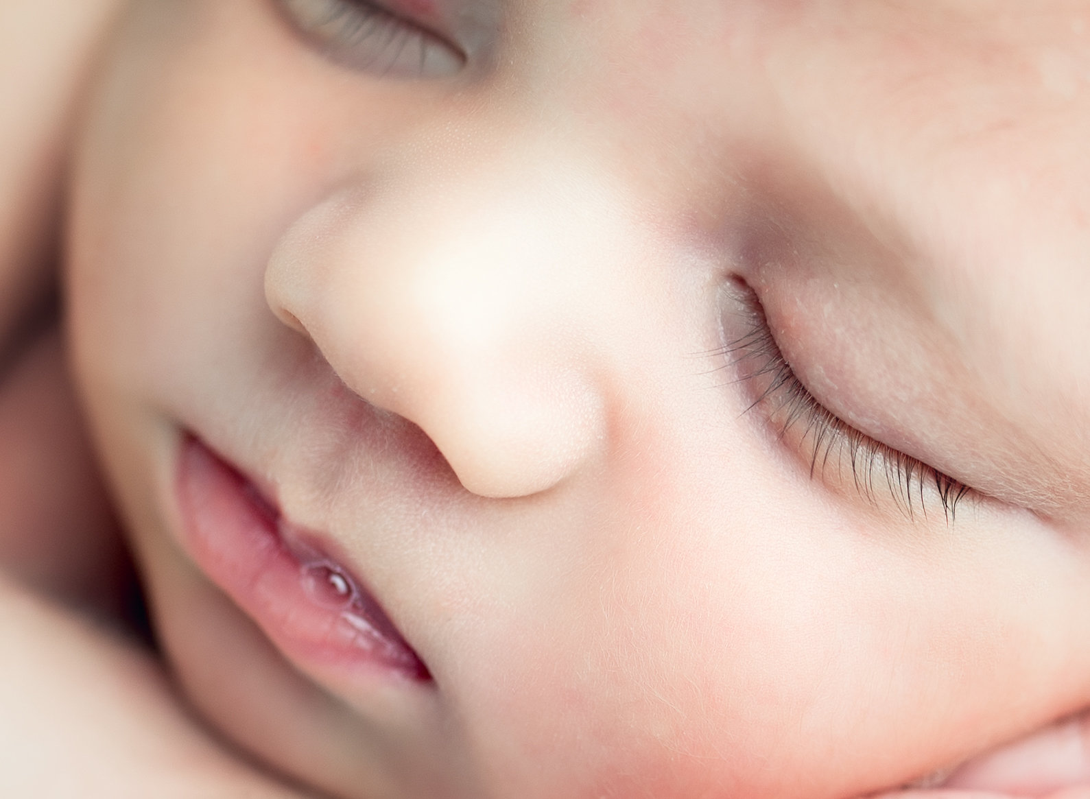 Closeup of sleeping newborn face