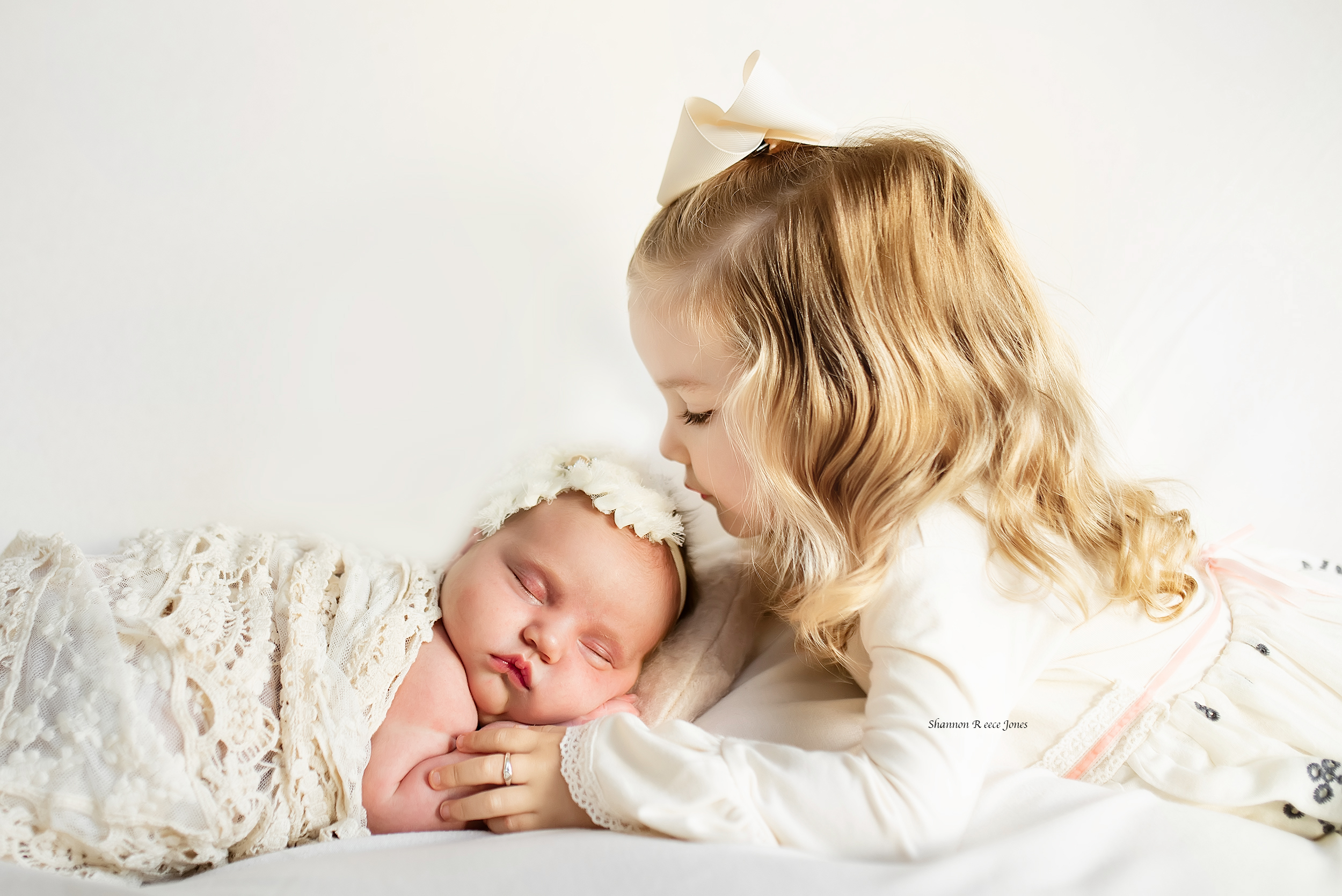 Newborn and hot sale sibling photos