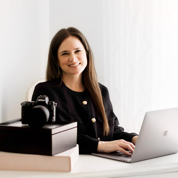 Headshot of Houston Texas brand and business photographer working in her office
