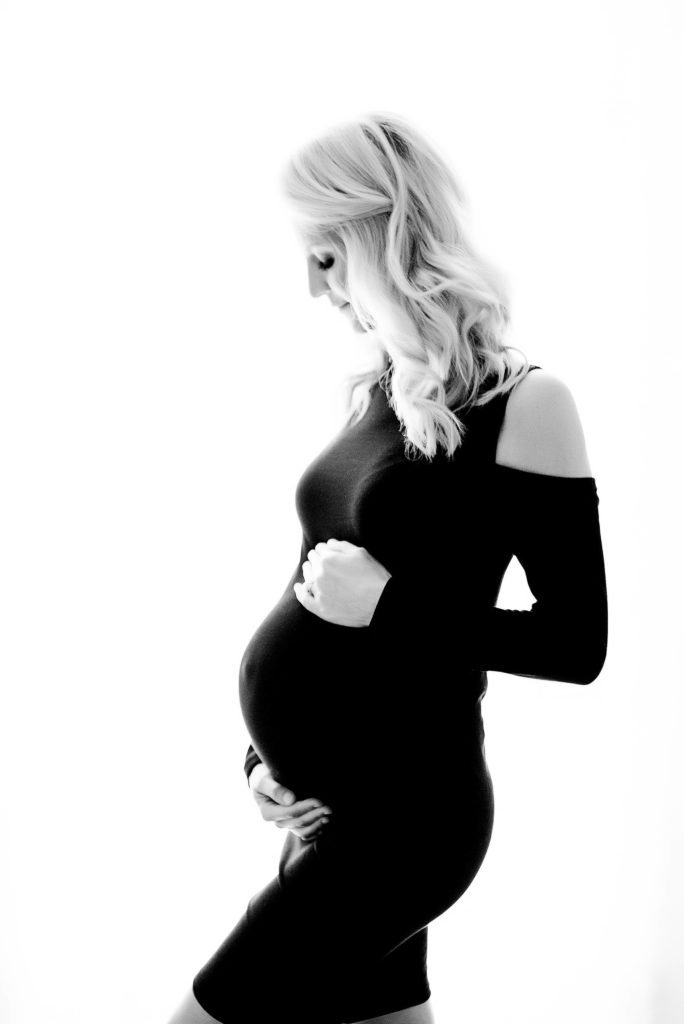 studio maternity photos near Houston TX, black and white profile of pregnant woman