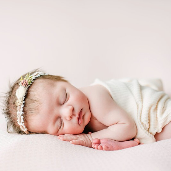 Newborn baby asleep in studio in The Woodlands, Texas. Tips for your newborn photography session