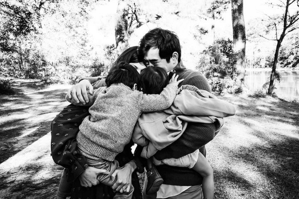 Happy new year, houston family hugging