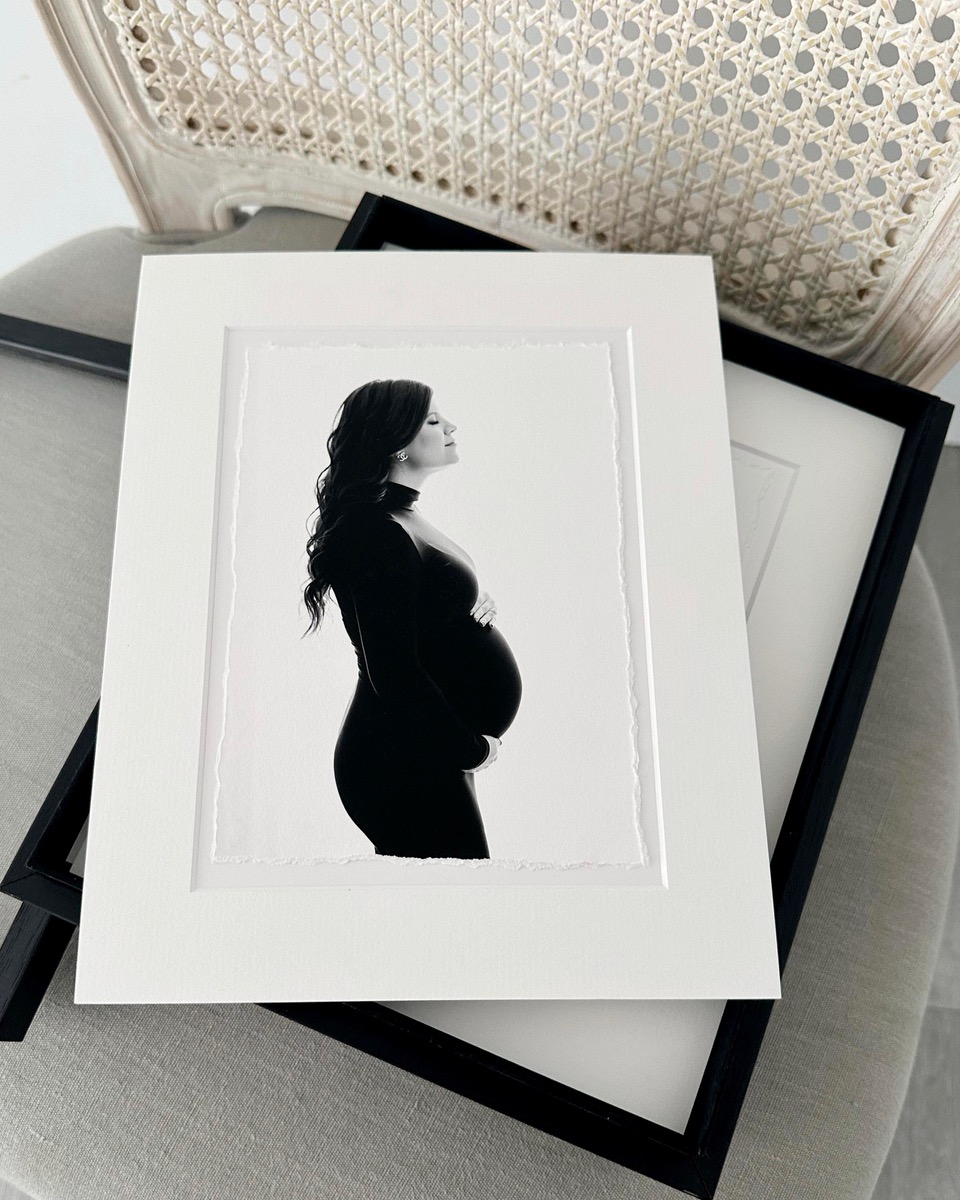 Matted black and white print from a luxury maternity portrait session in Houston TX studio