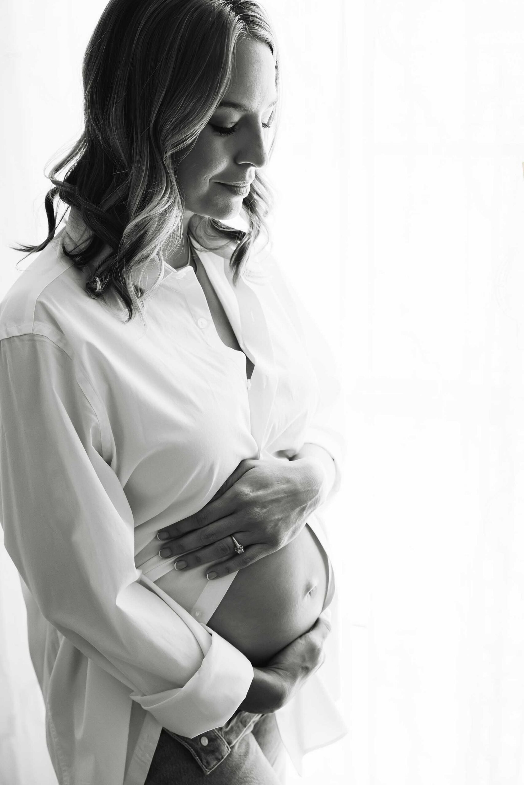 Jeans and button down - maternity pictures - In-home newborn photography Houston
