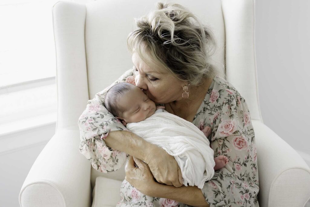 Houston newborn photographer - newborn baby at home with grandma